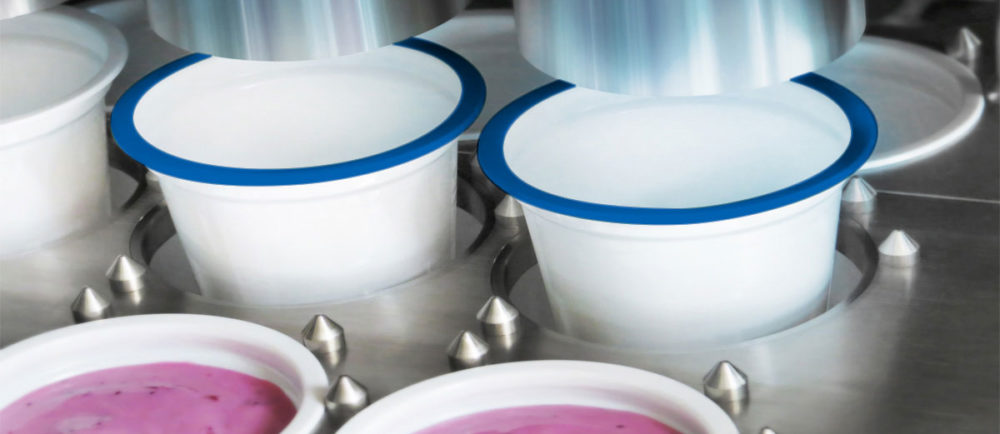 Fyllmaskiner bägare och flaskor